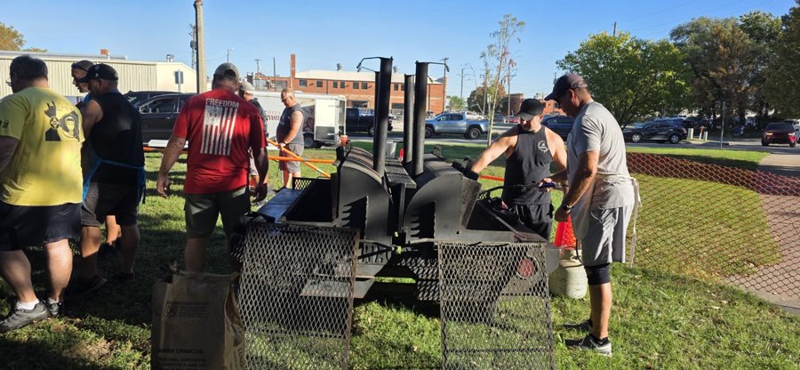 Volunteers working together at the grills at the October 9, 2026 Wichita Stand Down.