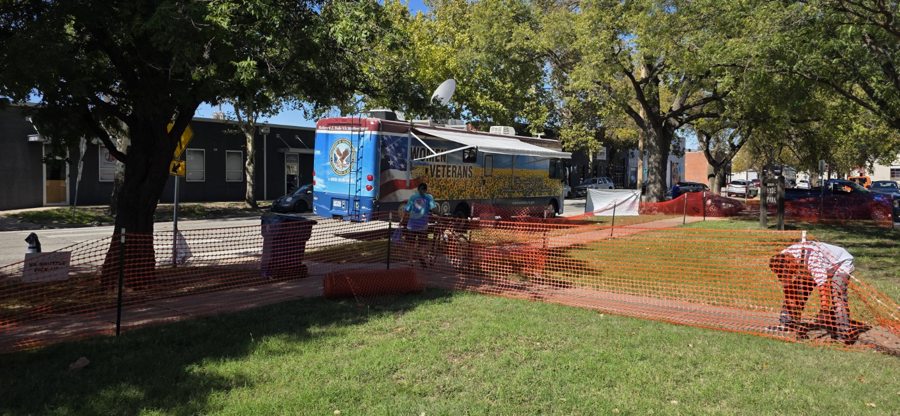 Outreach vehicles and tents around the park at the October 9, 2026 Wichita Stand Down.